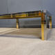 Table basse vintage en chrome et laiton dans le style de Romeo Rega, années 1970.