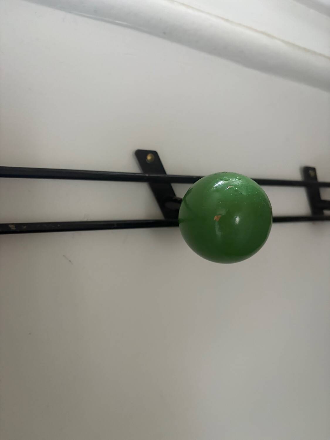 Retro coat rack with 3 red and green balls