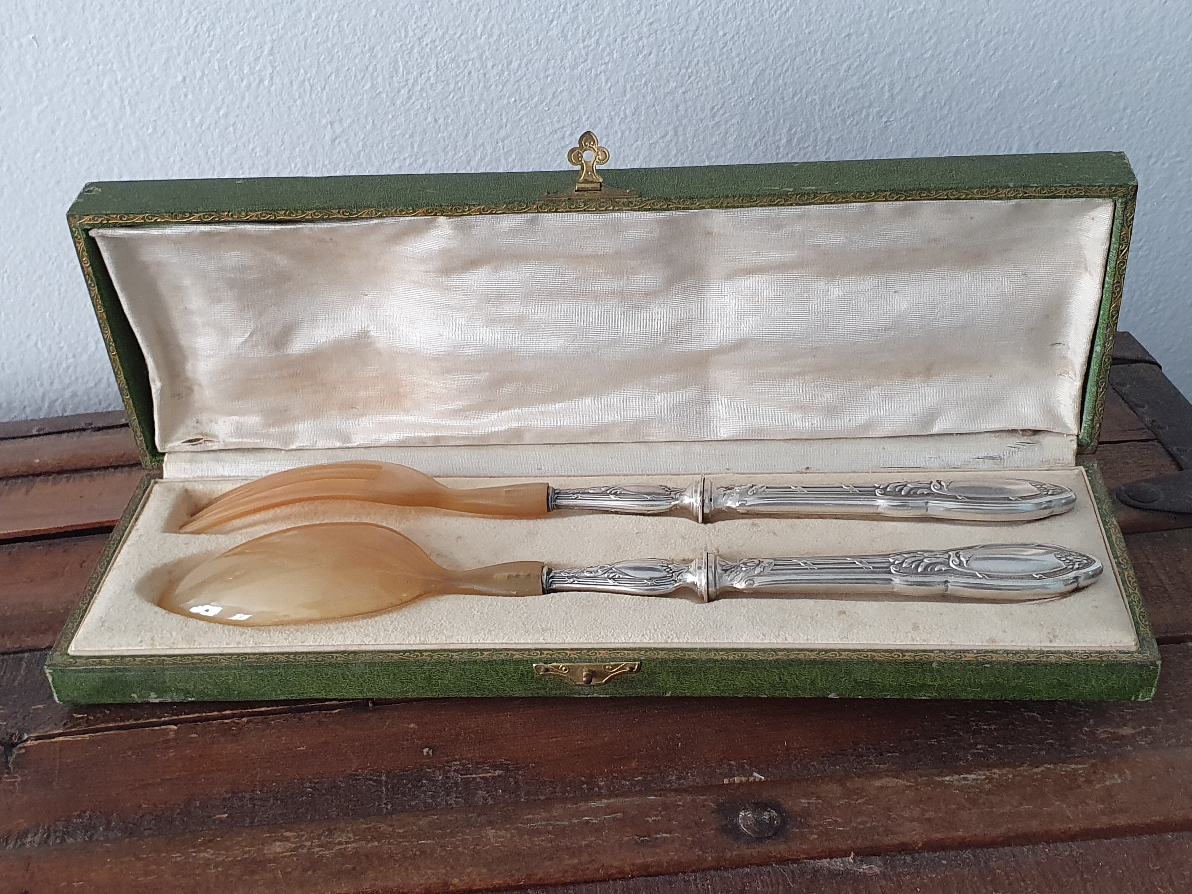 Filled silver metal handle salad covers