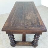 Louis XIII walnut table from the 19th century.