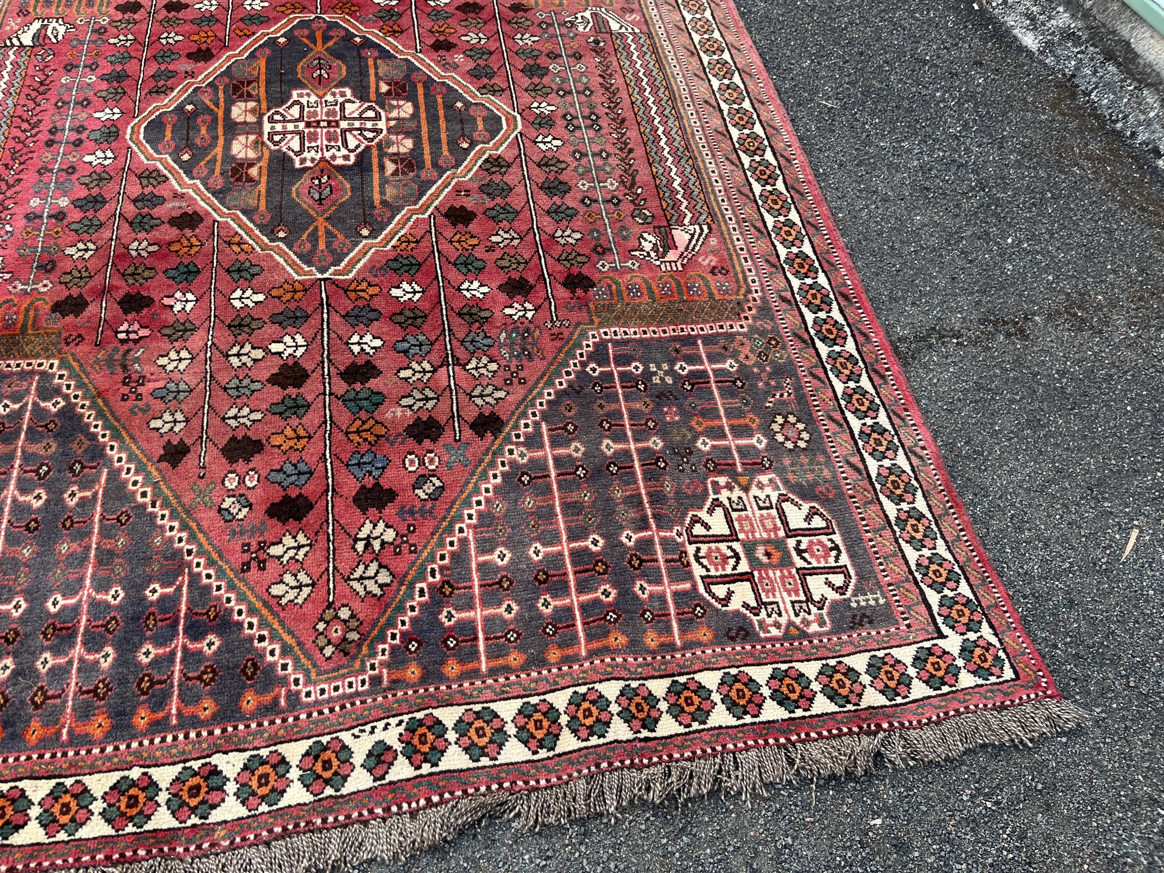 Large red Persian wool rug with red geometric design 2.97 x 2.05 m