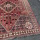 Large red Persian wool rug with red geometric design 2.97 x 2.05 m