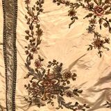 Bedspread converted into silk door with rich decorations embroidered in cinnamon, nineteenth