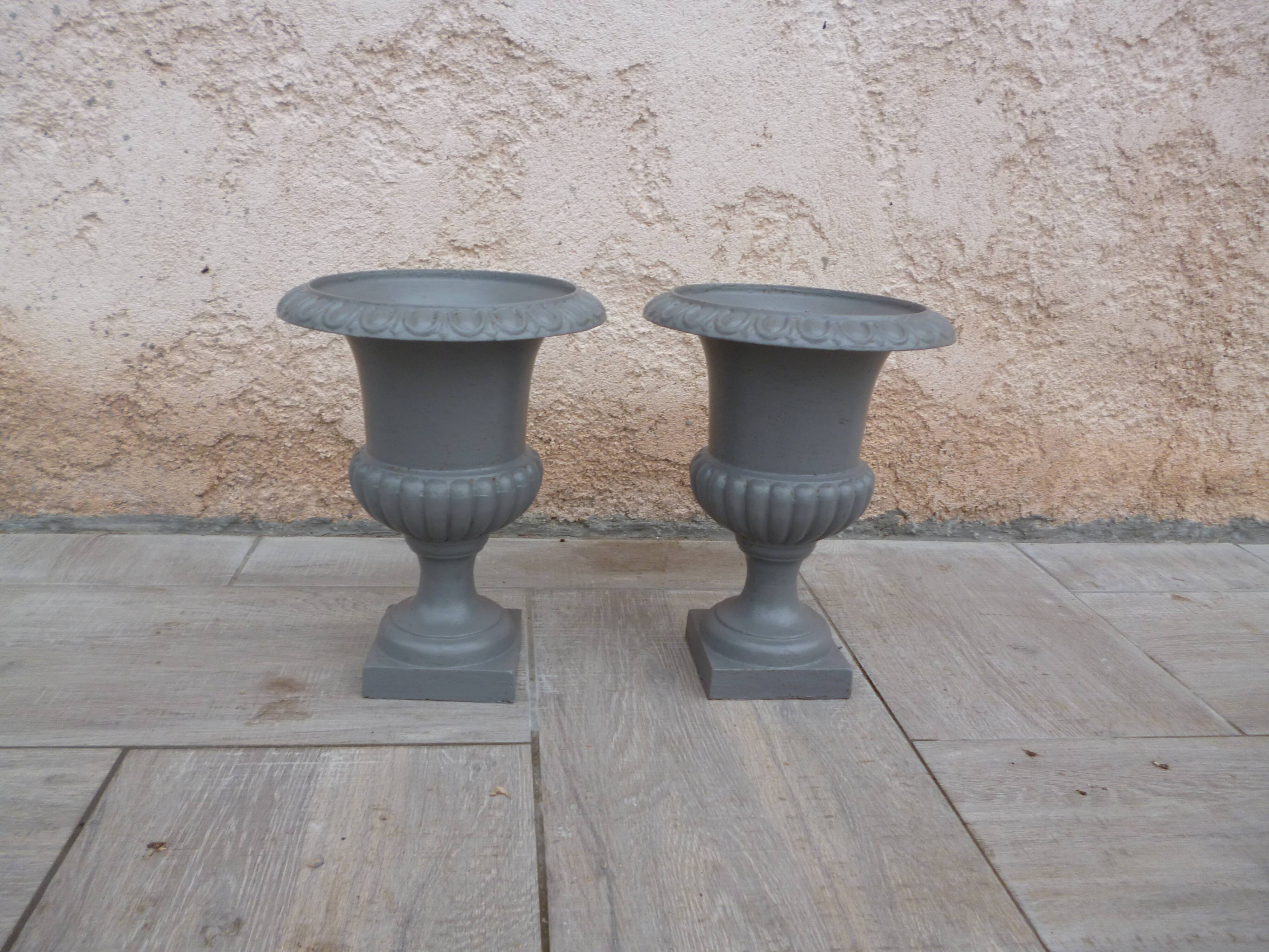 Pair of cast iron Medici vases