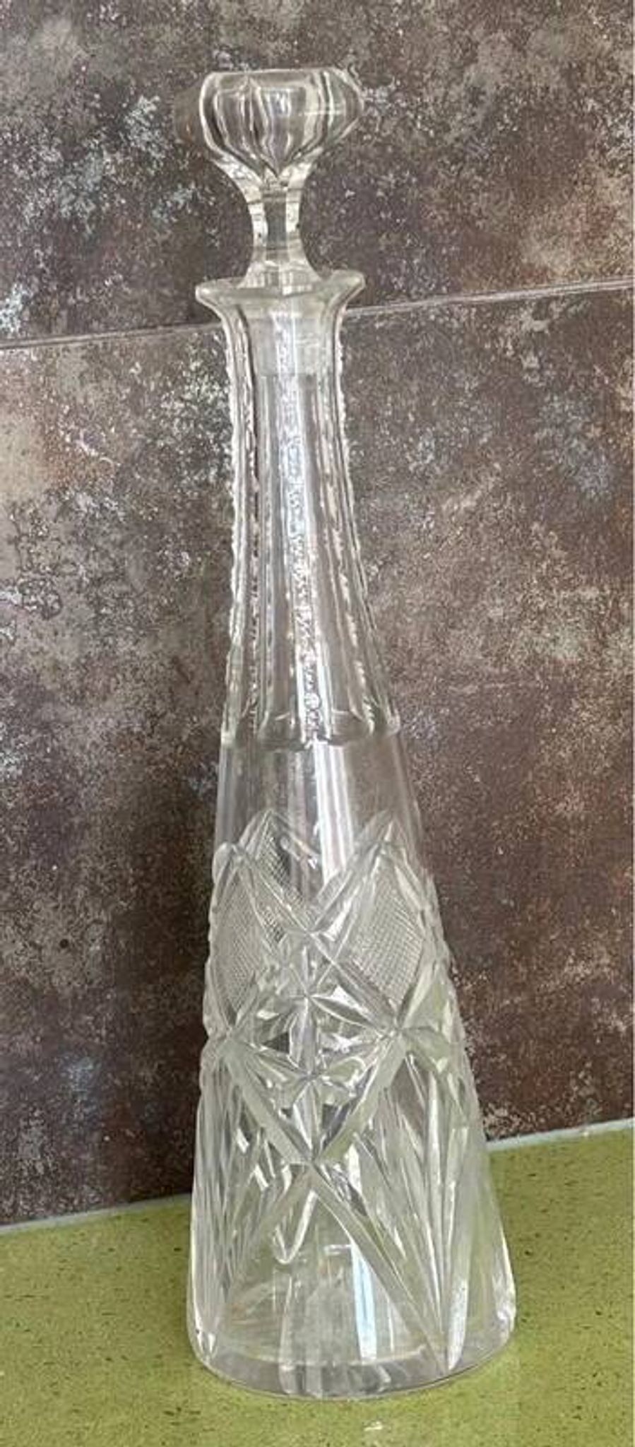 Long carafe with a cut Bohemian crystal stopper, design decor, 38.5 cm.
