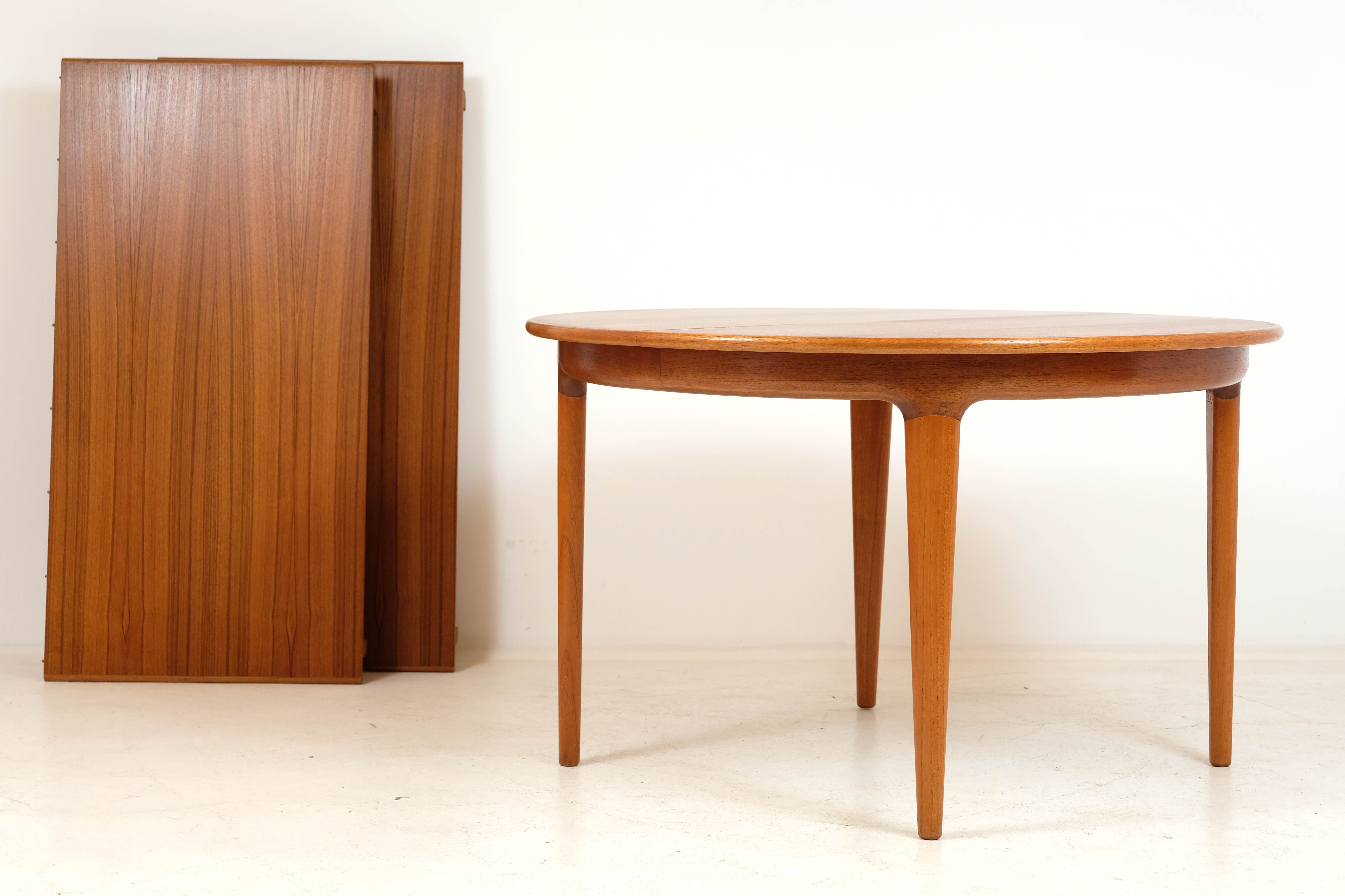 Teak extension table by J. Andersen for Uldum 1960
