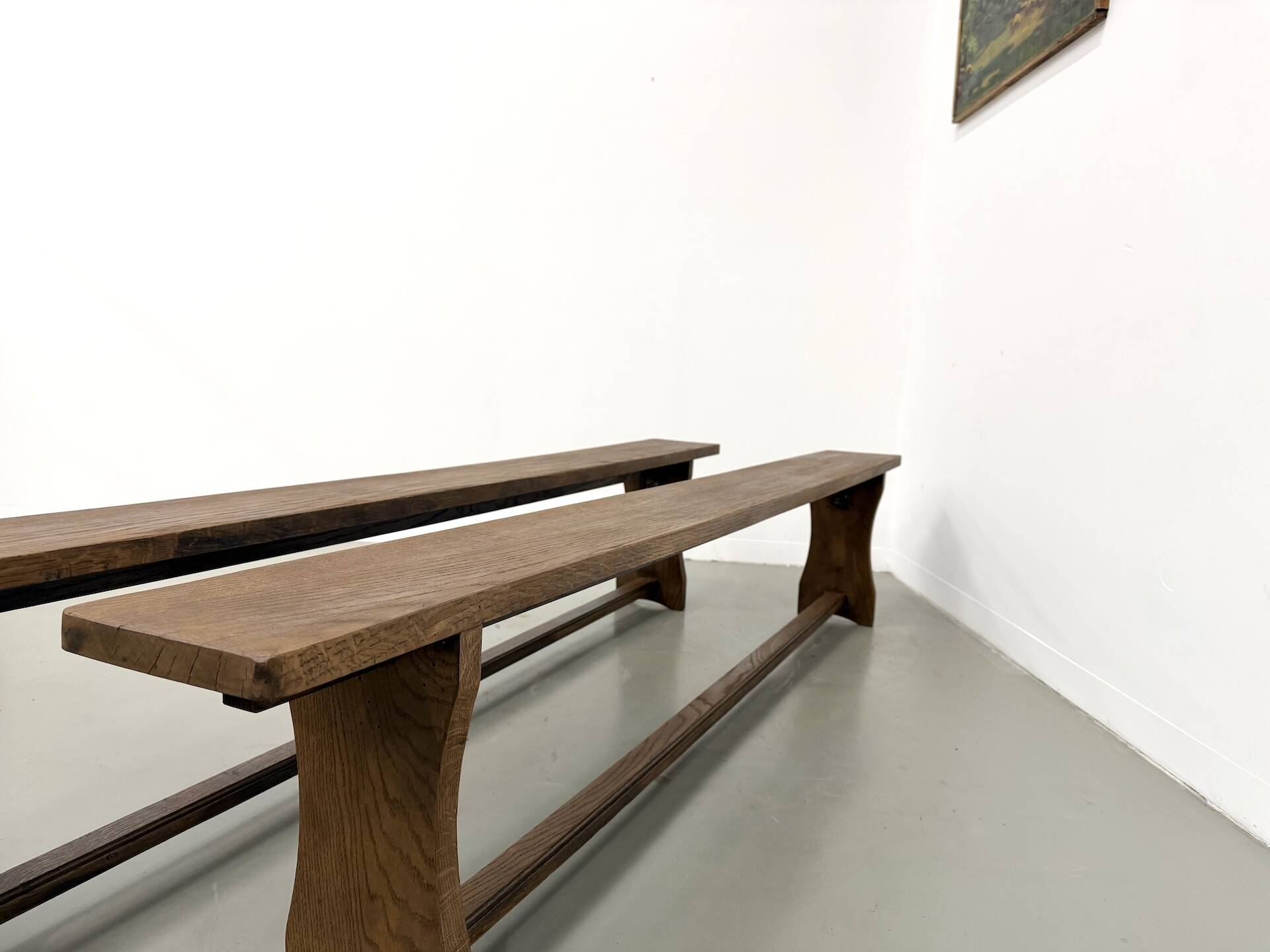 Pair of solid oak benches, winged legs, France, 1970s