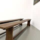 Pair of solid oak benches, winged legs, France, 1970s