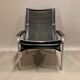 Paire de fauteuils relax inclinable cuir noir design 1960