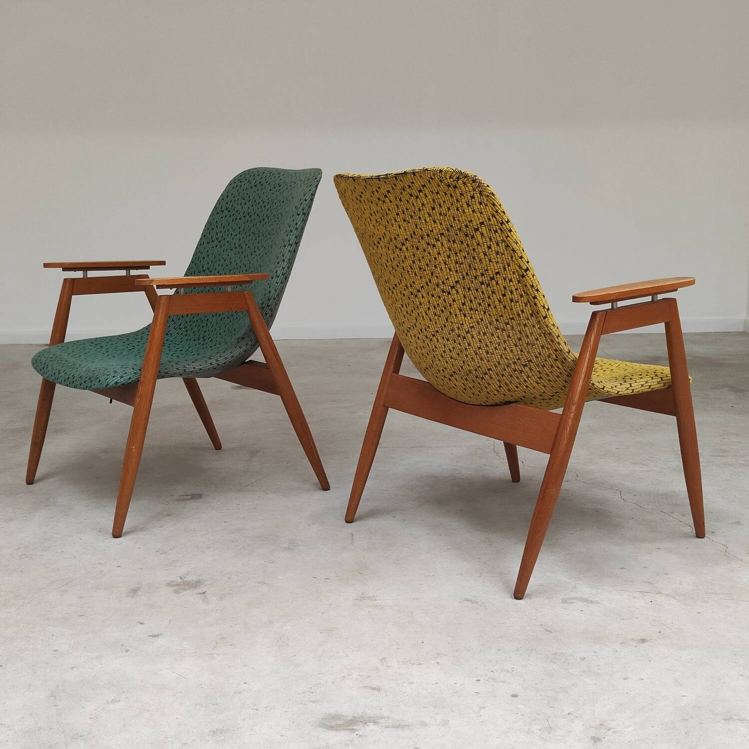 Pair of yellow and green resin and wood armchairs by Miroslav Navratil
