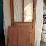 Old glazed door with its shutter
