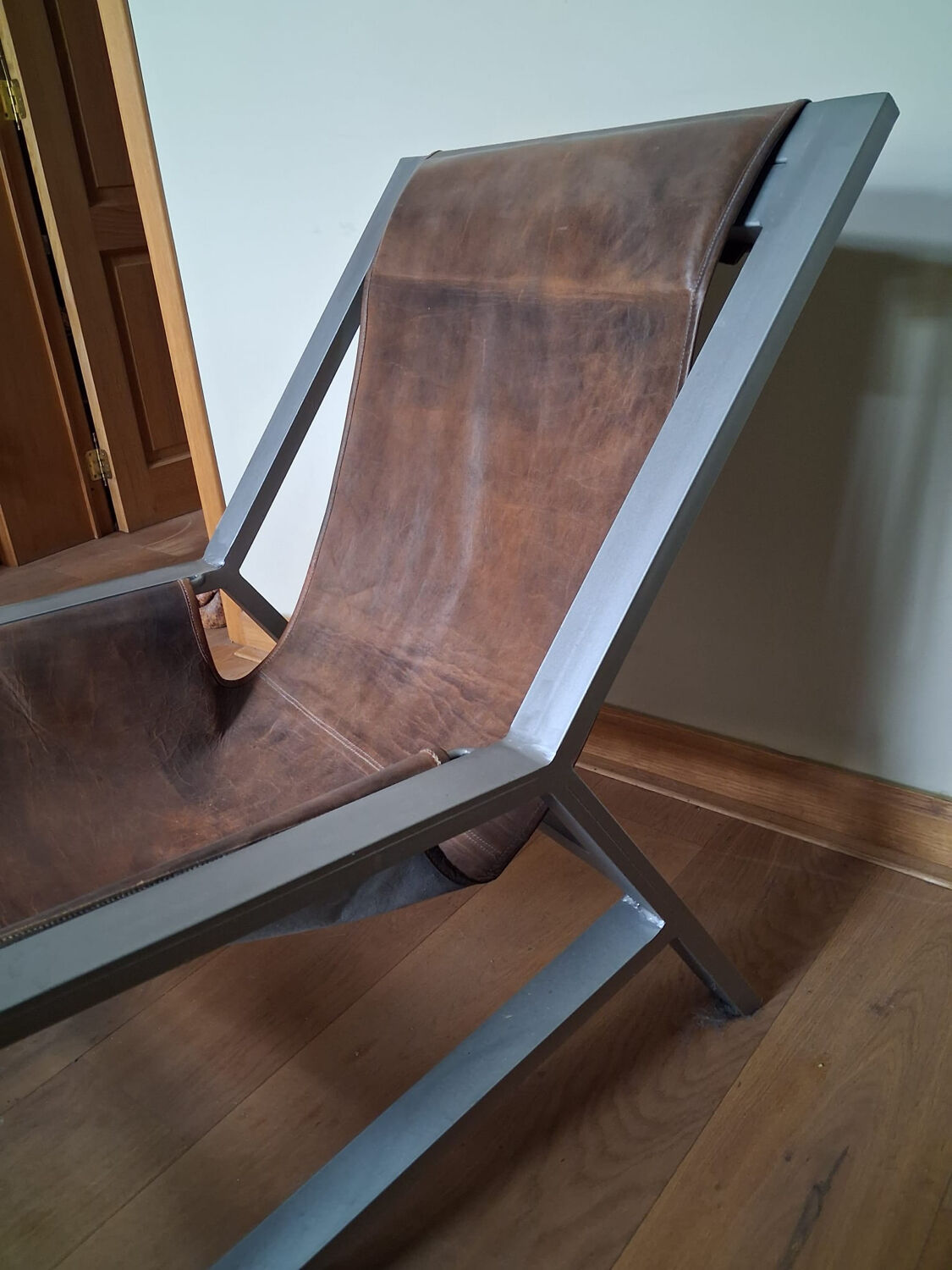 Brown leather armchair, J-Line