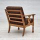 Fauteuil danois des années 1970, revêtement en laine verte, bois de chêne massif.