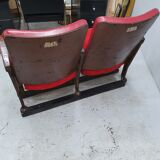 Series of 5 red skai and patinated cast Theater chairs