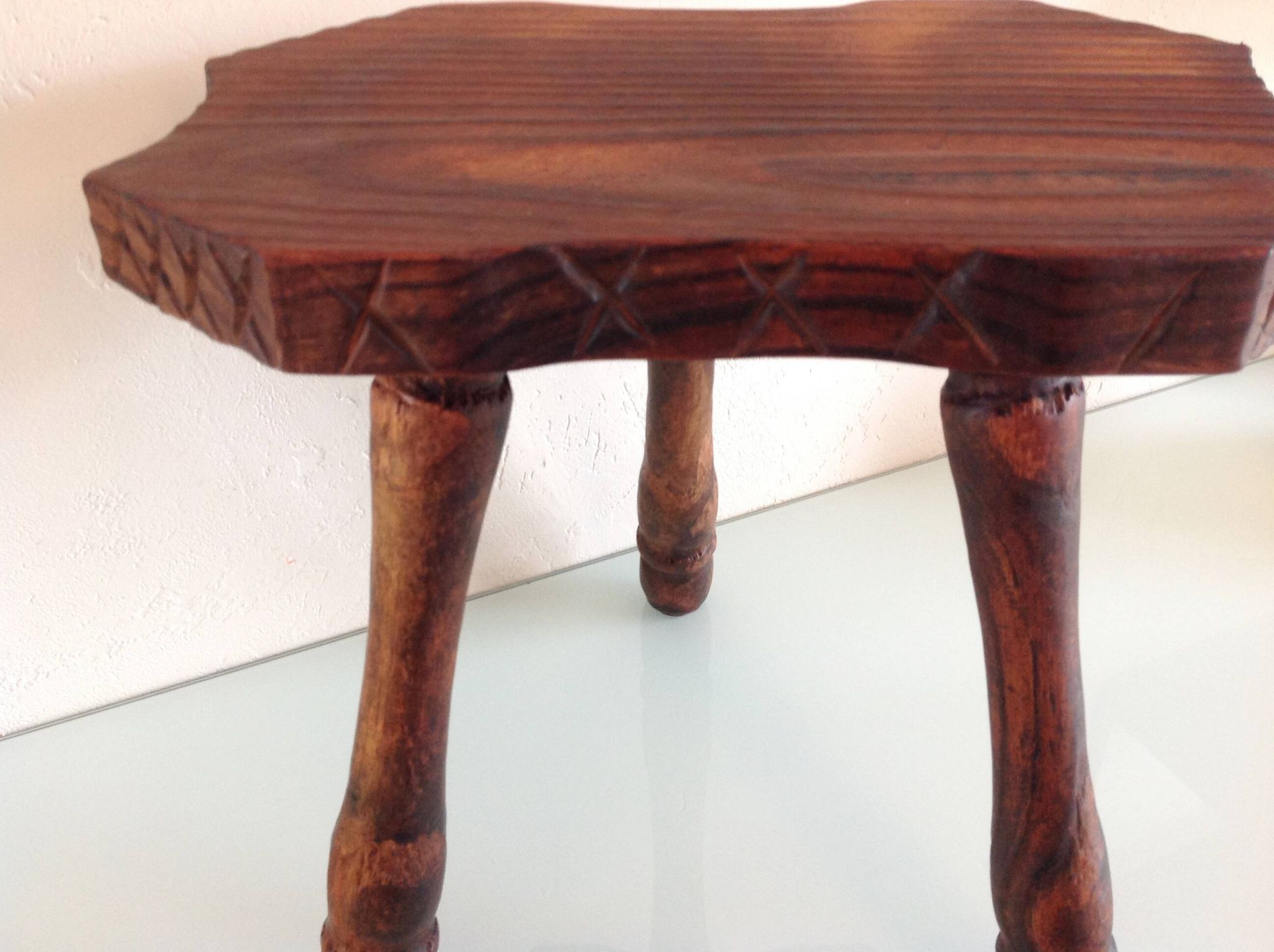 Vintage brutalist wooden tripod stool from the 60s and 70s