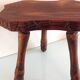 Vintage brutalist wooden tripod stool from the 60s and 70s