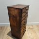 Small piece of furniture for a watchmaker or apothecary.