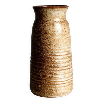 Spotted ceramic vase, rustic design.
