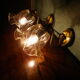 Wall lamps in gilded metal, verrine in the shape of amber glass corollas, 70s