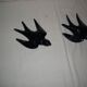 Pair of ceramic wall swallows