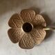 Brass flower candle holder