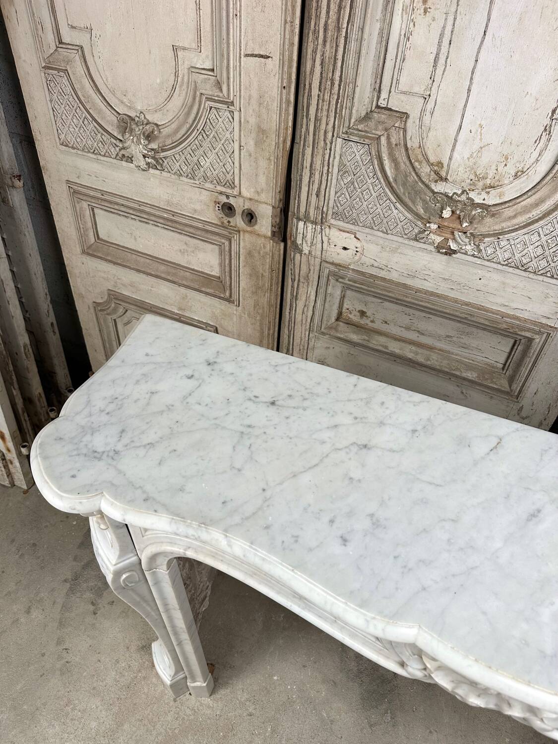 Louis XV style fireplace in white marble