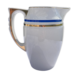 White porcelain decanter with blue and gold edging