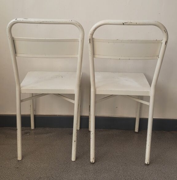 Pair of patinated white metal chairs
