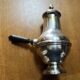 Silver-plated metal chocolate pot stamped ARGIT SFOA with an ebony handle.
