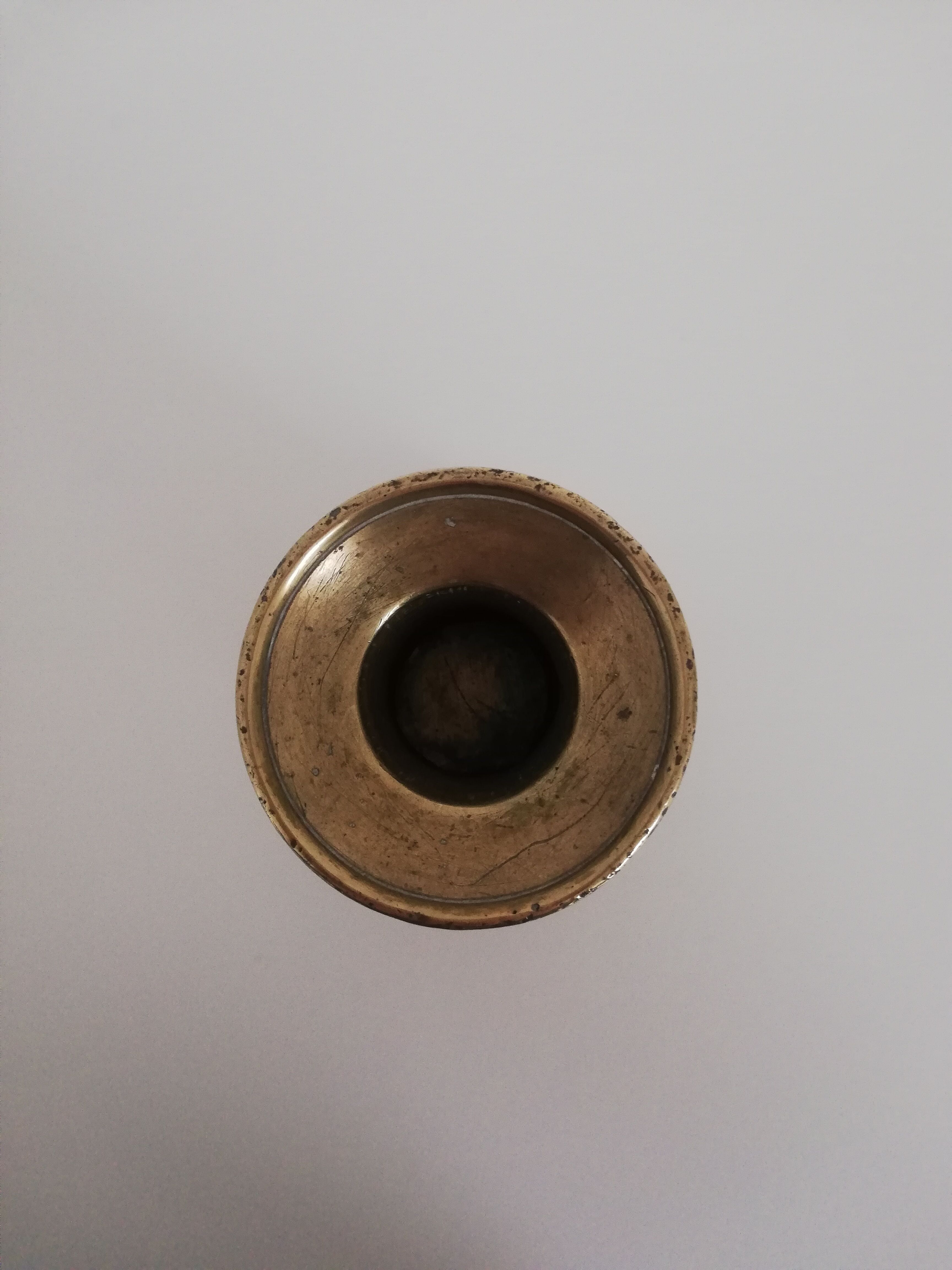 Vintage push candle holder