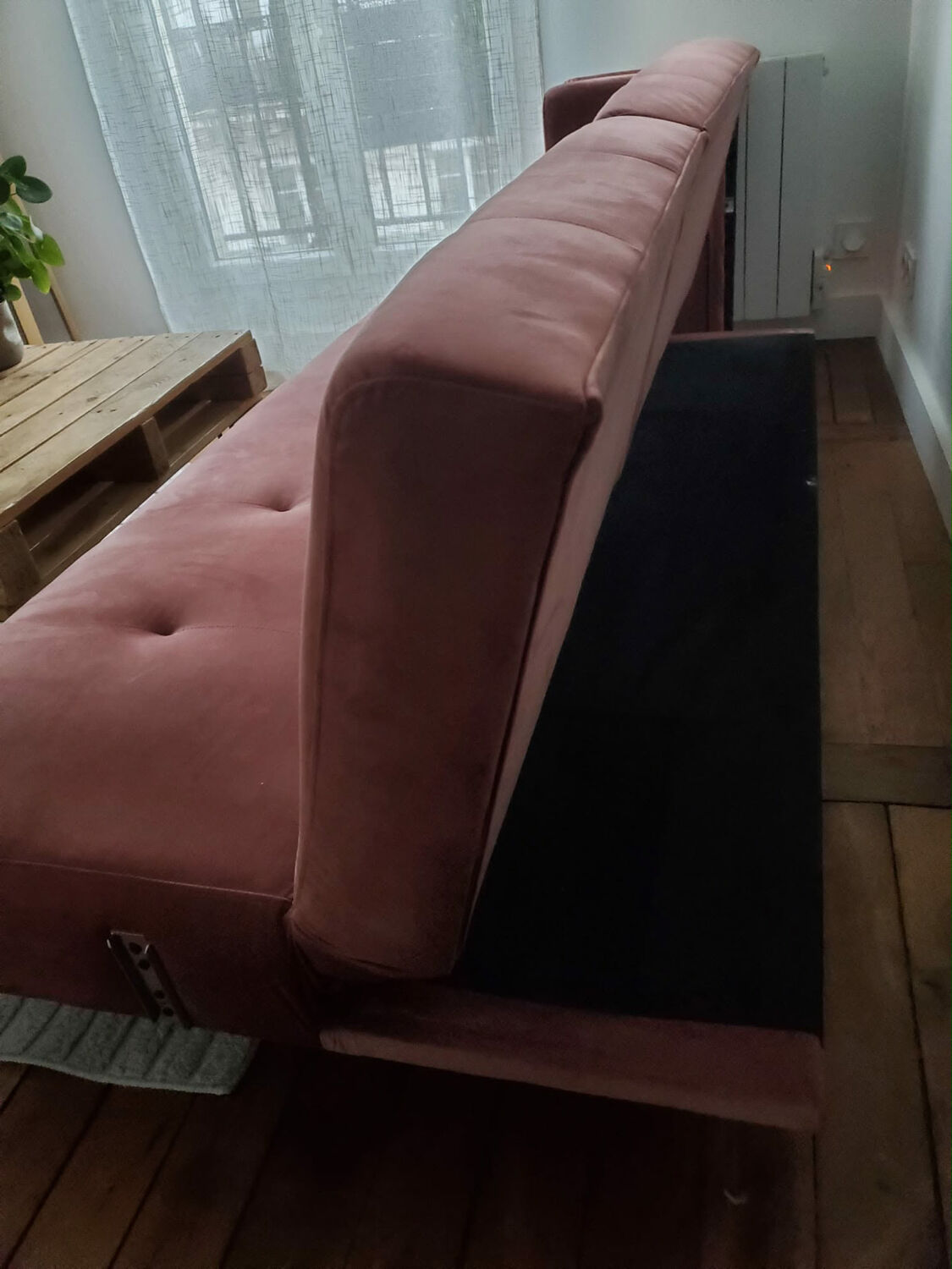 Powder pink convertible sofa