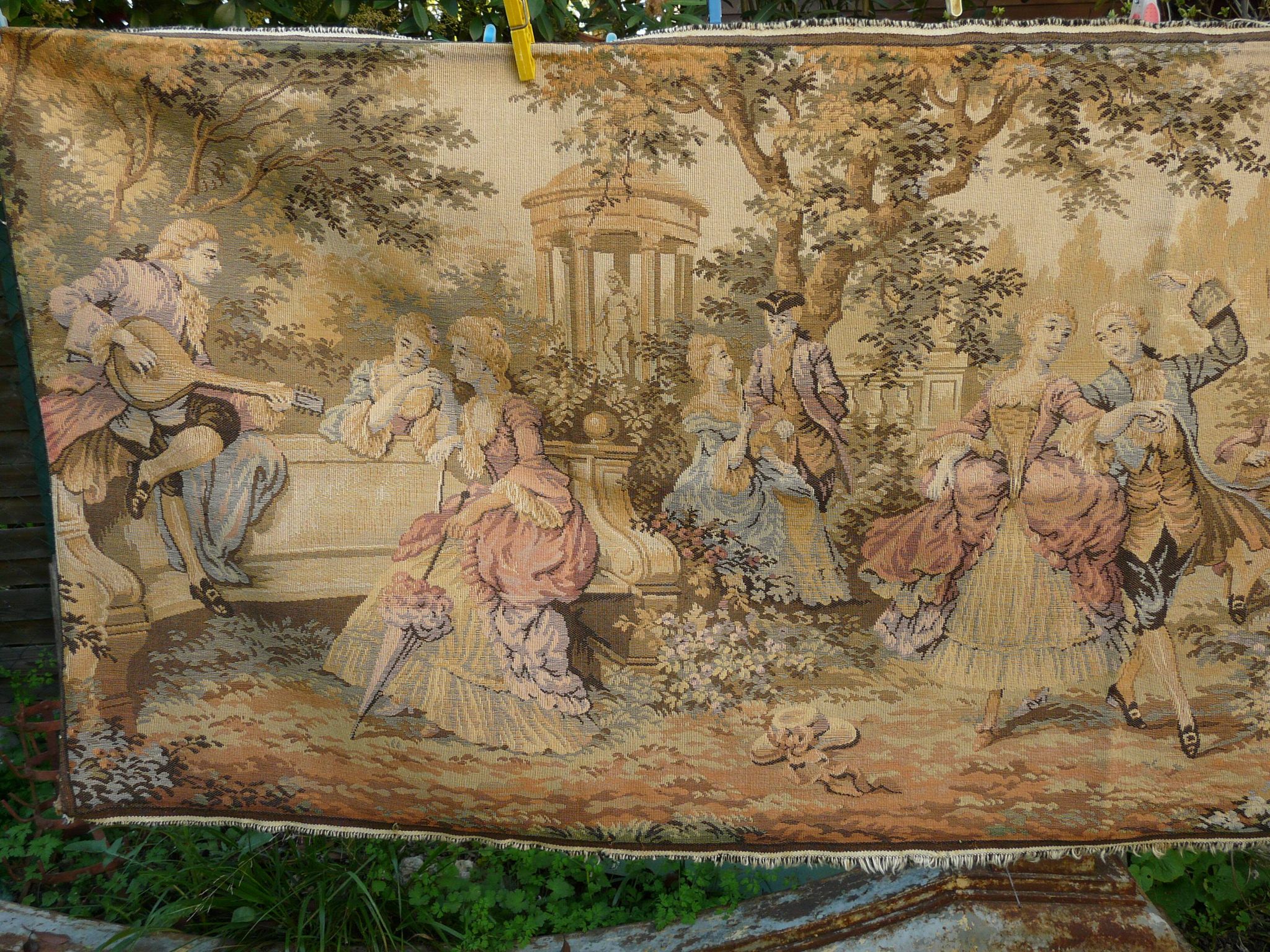 Tapestry wall hanging depicting a gallant scene from the mid-century.