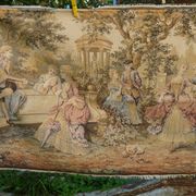 Tapestry wall hanging depicting a gallant scene from the mid-century.