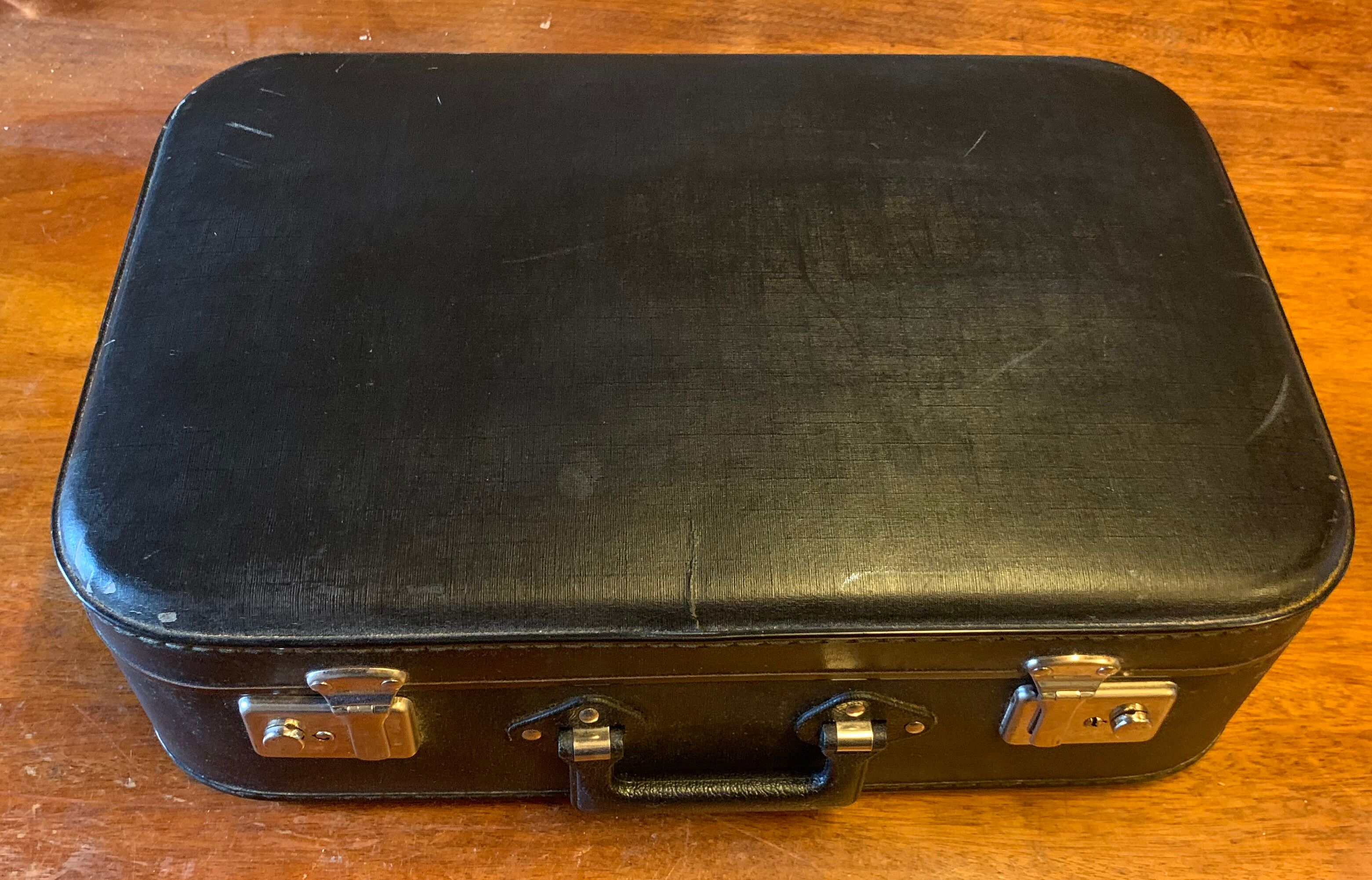 Black suitcase retro style
