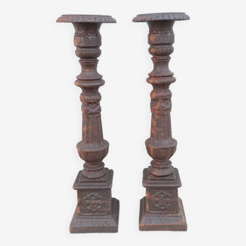 Pair of cast iron candlesticks