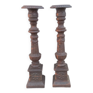 Paire de bougeoirs en - fonte