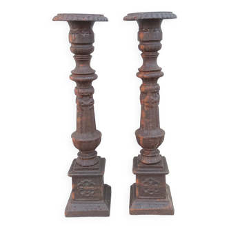 Pair of cast iron candlesticks