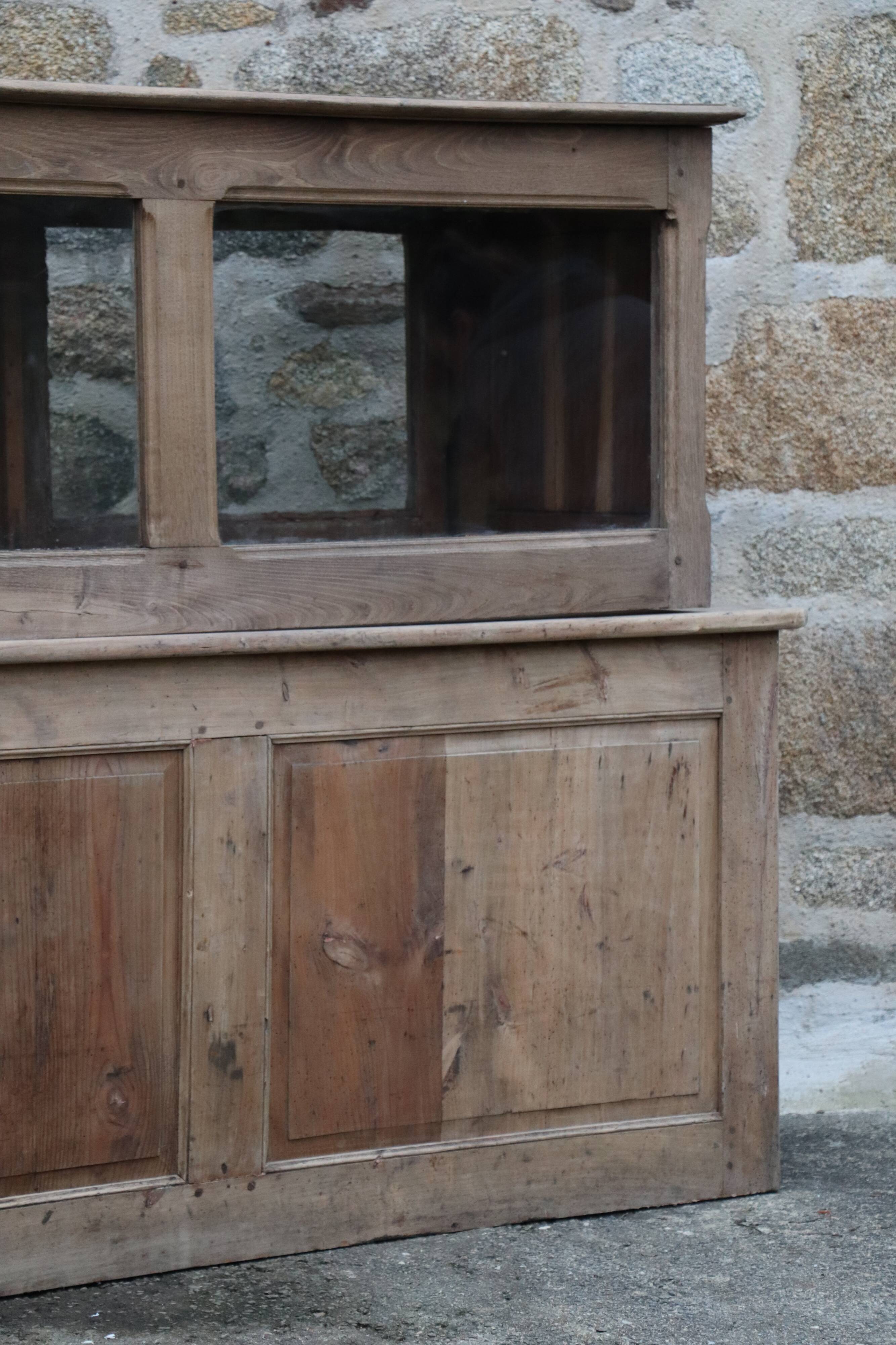 Comptoir vitrine chapellerie 1930