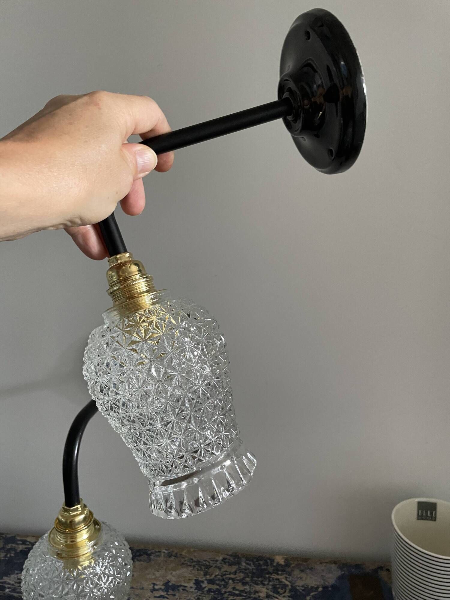 Pair of vintage electrified to nine-piece chiseled glass wall lamps