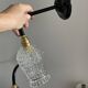 Pair of vintage electrified to nine-piece chiseled glass wall lamps