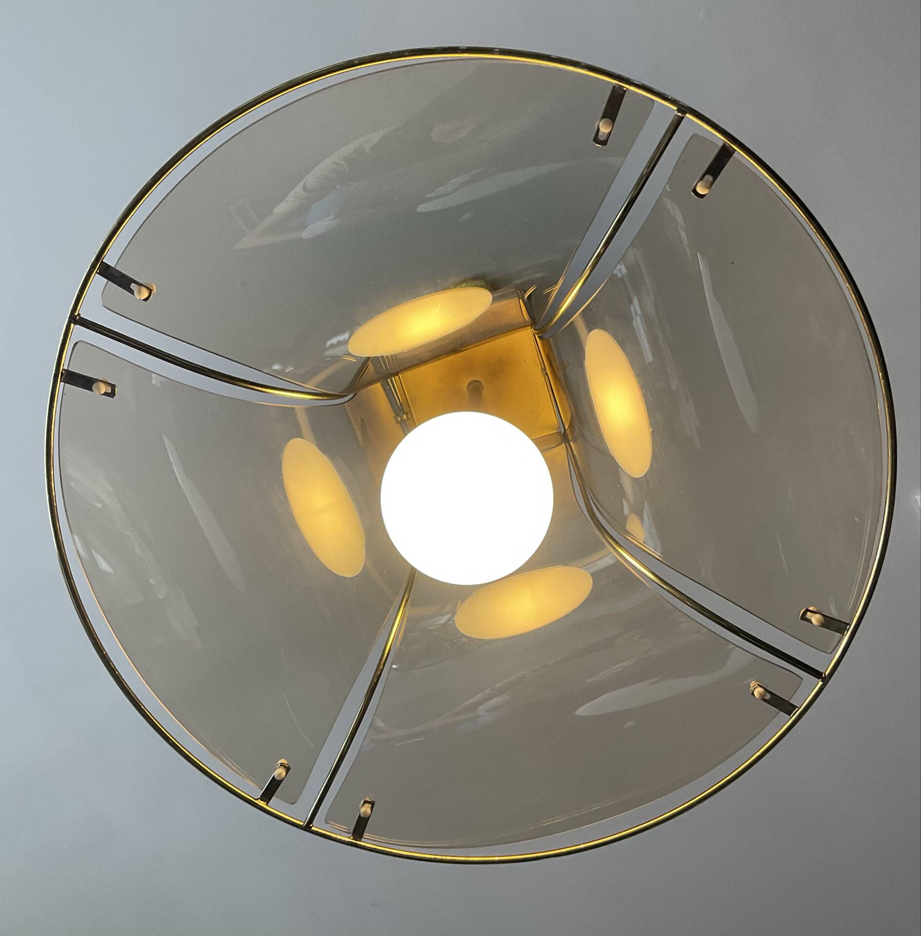 Italian suspension lamp in smoked glass and brass from the 1970s.