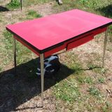 Dining table with red formica extensions