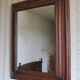 Large mirror in natural stained wood