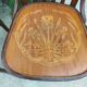 4 bentwood bistro chairs with a pattern on the seat
