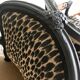Restored Louis XV-style leopard convertible chairs