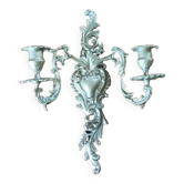 Cast iron wall candle holder with patinated gold metal