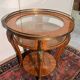 Display table in Louis XV style made of rosewood and violet wood.