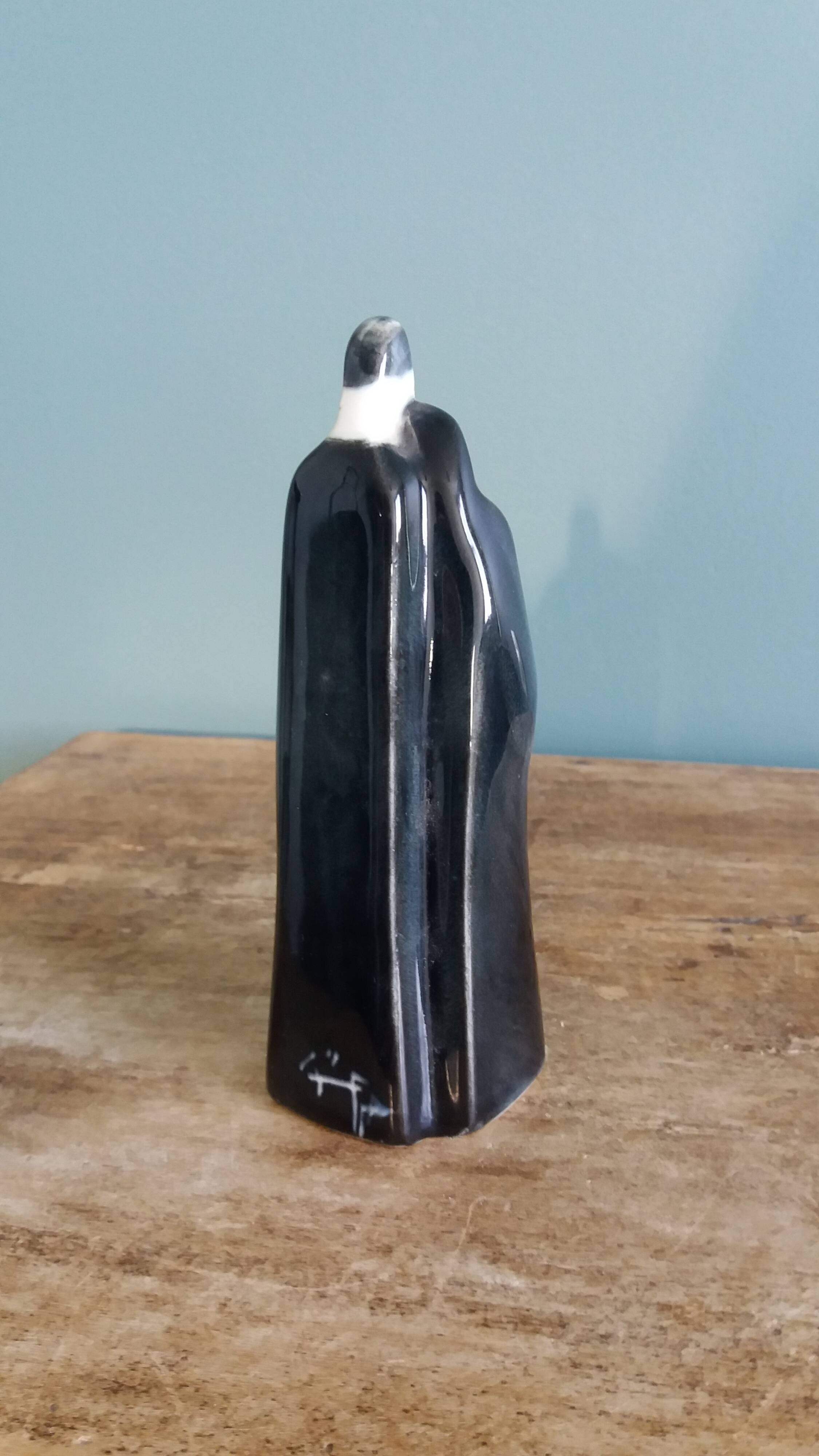 Porcelain sculpture signed Hassan Heshmat, Egypt