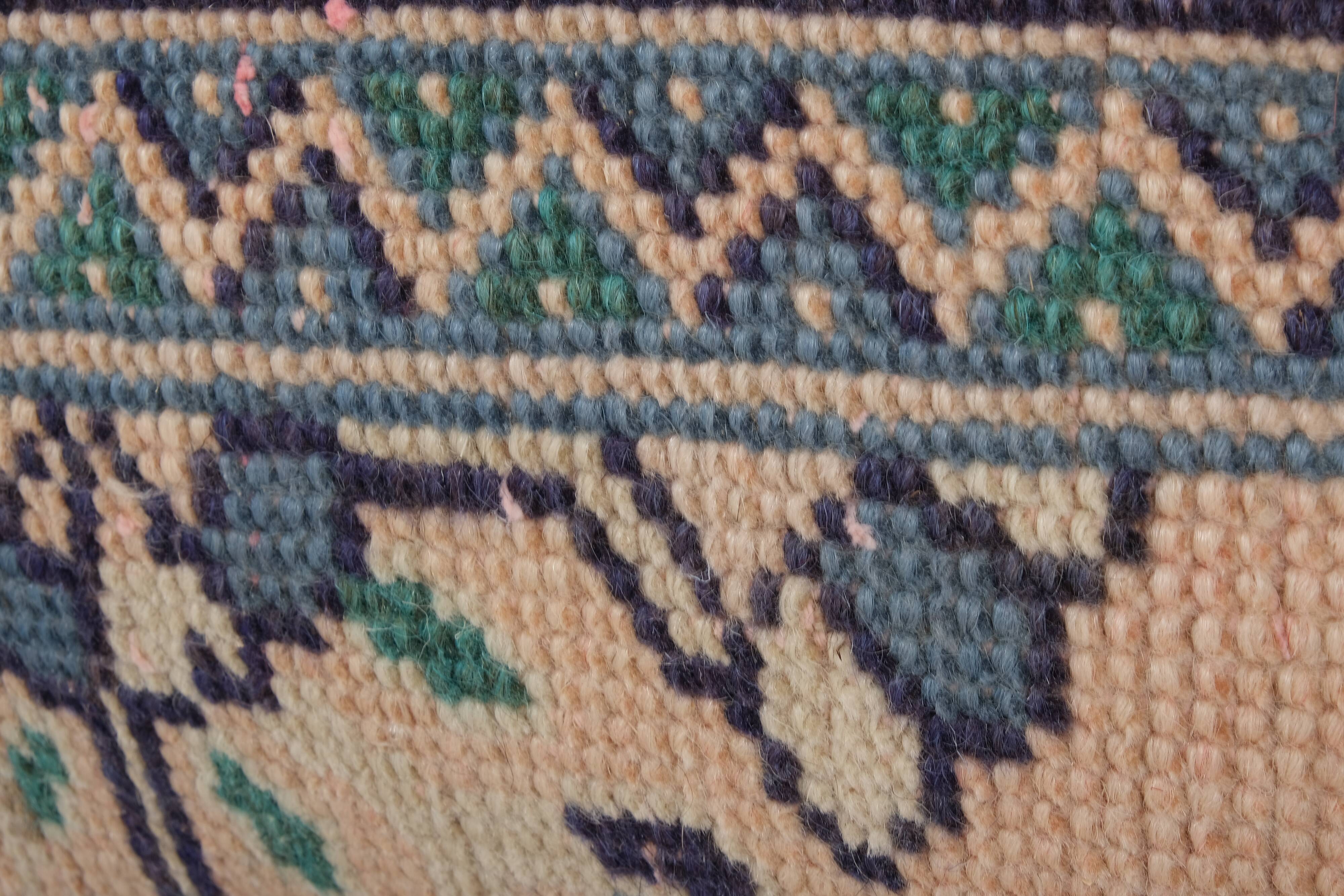 Set of two muted ecru carpet rug pillows