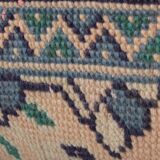 Set of two muted ecru carpet rug pillows